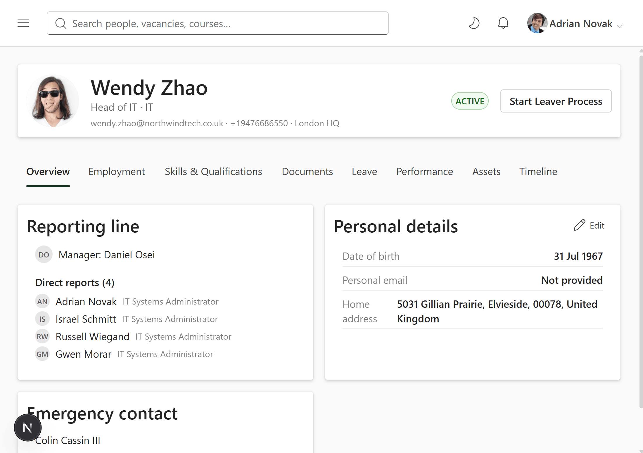 Employee profile screen showing personal details, reporting line and direct reports